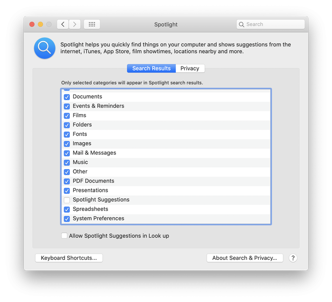 How to turn off spotlight search on Mac